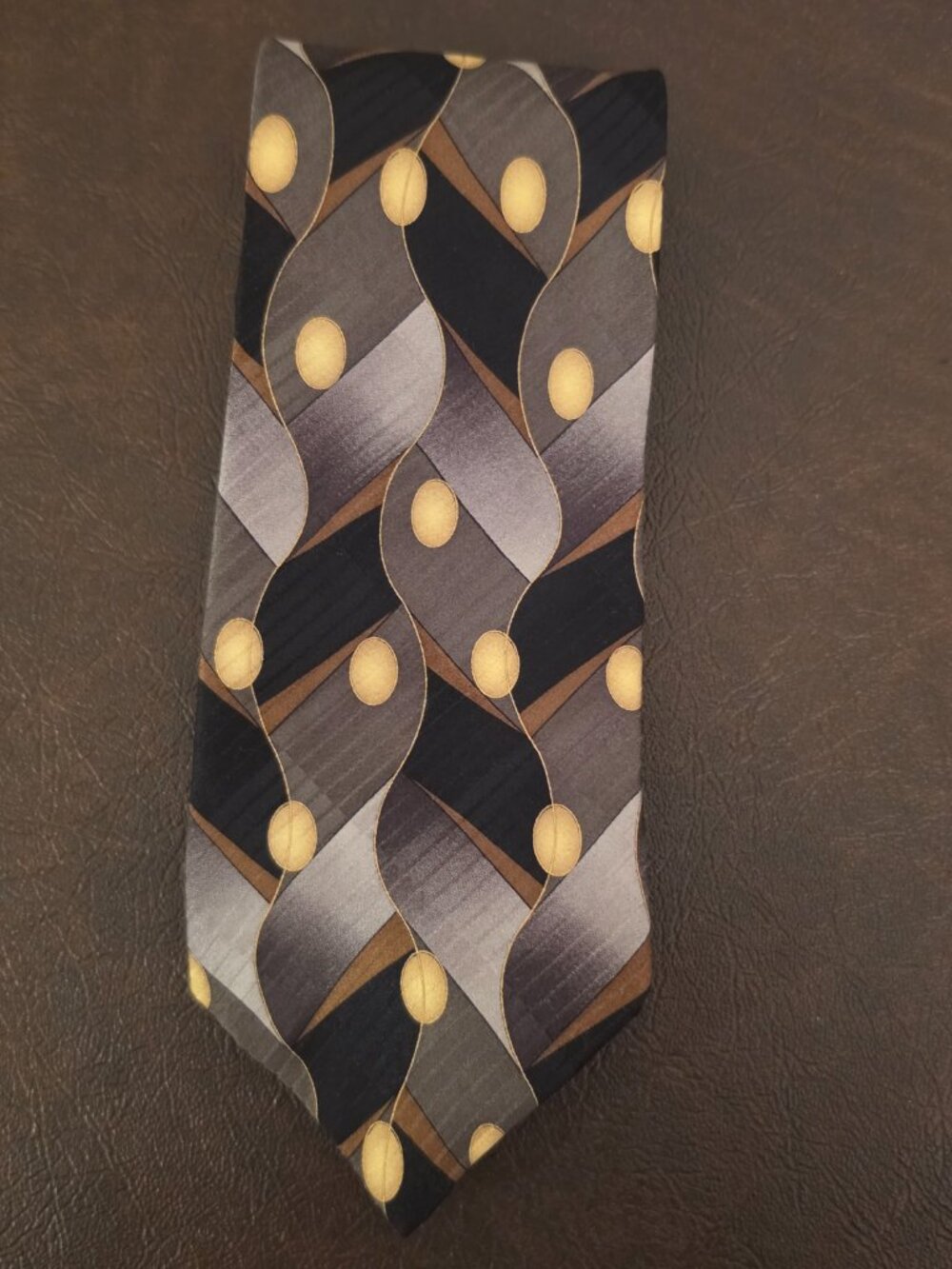 FACETS Men's Tie pattern of yellow circles on gray/black background modern